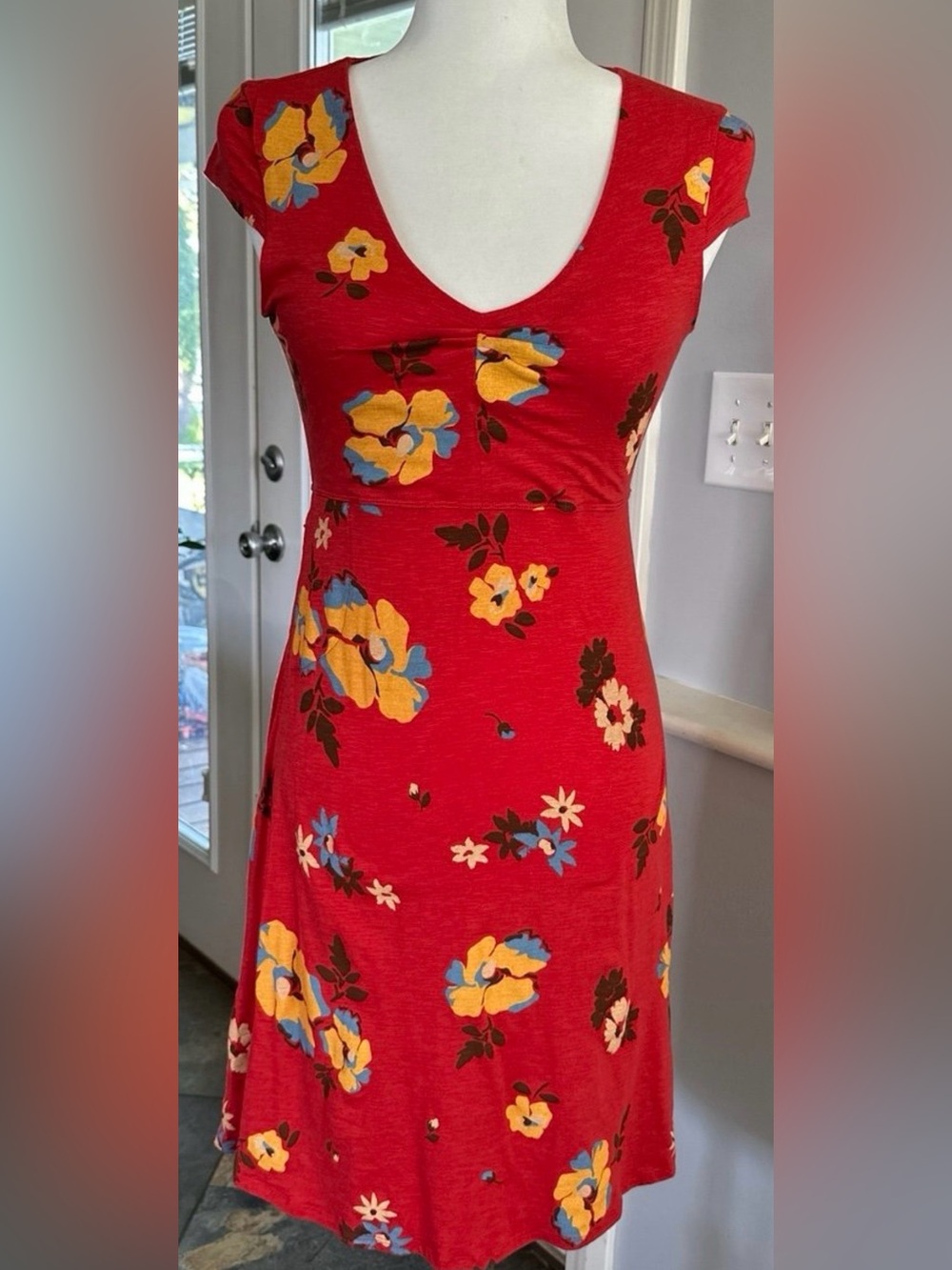 Orange Floral Dress with Yellow and Blue Accents